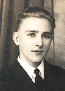 A young man in a suit