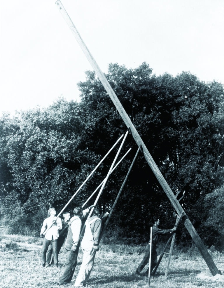 setting pole by men https://goroseau.com/wp-content/uploads/2024/03/Minnkota-Power-Cooperative-Setting-Poles.jpg