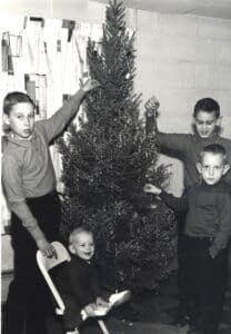 four boys are a christmas tree